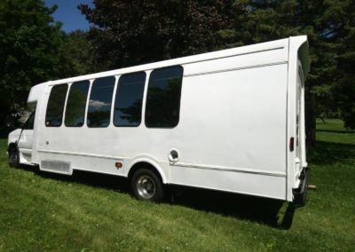 Limo Coach 22 Passenger Turtle Top Drivers Rear View